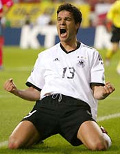 Michael Ballack exults after scoring.